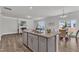 Kitchen island with granite countertops and modern sink fixtures at 3505 Triad Ct, Raleigh, NC 27604