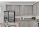 Stylish kitchen with stainless steel appliances and granite countertops at 3505 Triad Ct, Raleigh, NC 27604