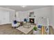 Cozy living room with fireplace and lots of natural light at 3505 Triad Ct, Raleigh, NC 27604