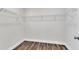 Walk-in closet with ample storage space and durable wood-look flooring at 3505 Triad Ct, Raleigh, NC 27604