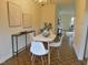 Cozy dining room with hardwood floors and modern decor at 3738 Jamestown Cir, Raleigh, NC 27609