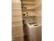 Laundry room with washer, shelves and storage space at 3738 Jamestown Cir, Raleigh, NC 27609