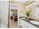 Bathroom with double sinks and a view of the Primary bedroom at 402 Hearthstone Dr, Nashville, NC 27856