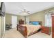 Spacious bedroom featuring carpet, a ceiling fan, and lots of natural light at 402 Hearthstone Dr, Nashville, NC 27856