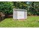 Outdoor storage shed on a well manicured lawn at 402 Hearthstone Dr, Nashville, NC 27856