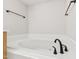 Inviting bathroom features a large jacuzzi tub, neutral walls, and contemporary fixtures at 4211 Norman Ridge Ln, Raleigh, NC 27613