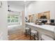 Kitchenette featuring white countertops, stainless steel appliances and breakfast bar at 4211 Norman Ridge Ln, Raleigh, NC 27613