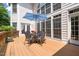 An expansive wooden deck offers backyard views at 4613 Moores Creek Rd, Durham, NC 27705