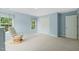 Relaxing bedroom features soft blue walls and natural light, creating a calming space at 4613 Moores Creek Rd, Durham, NC 27705
