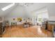 Large, versatile bonus room features hardwood flooring, vaulted ceiling, and a skylight at 4613 Moores Creek Rd, Durham, NC 27705