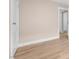 Bedroom with light hardwood floors and large doorway at 502 S Eighth St, Mebane, NC 27302