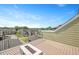 Outdoor balcony offers neighborhood views, a modern gas fire pit, and deck plank flooring at 513 Brooks St, Wake Forest, NC 27587
