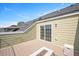 Private balcony with sliding glass door and modern gas fire pit and backyard views at 513 Brooks St, Wake Forest, NC 27587