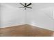 Bedroom with wood-look floors and ceiling fan at 613 Penncross Dr, Raleigh, NC 27610