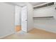 Walk-in closet with shelving and carpeted floor at 613 Penncross Dr, Raleigh, NC 27610