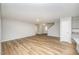 Spacious living room featuring hardwood floors, recessed lighting and views of the kitchen at 66 W Emily Gardens Dr, Selma, NC 27576