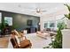 Stylish living room featuring modern furniture, large windows, and a cozy atmosphere at 6928 Leesville Rd, Raleigh, NC 27613