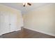 Bedroom with hardwood flooring and a closet at 713 Ramsours Mill Dr, Holly Springs, NC 27540