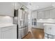 Contemporary kitchen with stainless steel appliances and sleek gray cabinetry at 713 Ramsours Mill Dr, Holly Springs, NC 27540