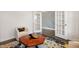 Comfortable office area featuring stylish furniture and ample sunlight, ideal for working or reading at 713 Ramsours Mill Dr, Holly Springs, NC 27540