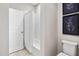 Cozy bathroom featuring a shower-tub combo with a white shower curtain at 728 Peninsula Forest Pl, Cary, NC 27519