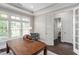 Sunlit office featuring a tray ceiling, large window, and ample space for productivity at 728 Peninsula Forest Pl, Cary, NC 27519