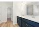 Modern bathroom vanity with double sinks, stylish fixtures, and ample storage at 74 W Emily Gardens Dr, Selma, NC 27576