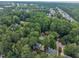 Lush green neighborhood view from above, capturing the area's mature trees and vibrant surroundings at 7917 Featherstone Dr, Raleigh, NC 27615