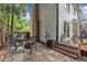 Inviting backyard patio with comfortable seating, a fire pit, and scenic landscaping at 7917 Featherstone Dr, Raleigh, NC 27615