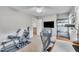 Spacious bedroom used as a workout area, featuring exercise equipment and a sleek TV at 7917 Featherstone Dr, Raleigh, NC 27615