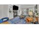 Inviting living room with a fireplace, built-in shelving, and comfortable seating area at 7917 Featherstone Dr, Raleigh, NC 27615