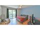 Cozy bedroom with a sliding door to the balcony and a relaxing space at 875 Martin Luther King Jr Blvd # 7, Chapel Hill, NC 27514