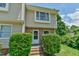 Charming townhouse with brick facade, manicured bushes, and inviting entrance at 875 Martin Luther King Jr Blvd # 7, Chapel Hill, NC 27514