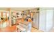 Bright kitchen featuring stainless steel appliances, light wood cabinets, island with seating and open shelving at 875 Martin Luther King Jr Blvd # 7, Chapel Hill, NC 27514