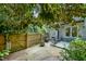 Private patio area with grill, fire pit, and outdoor dining set, ideal for relaxation and gatherings at 875 Martin Luther King Jr Blvd # 7, Chapel Hill, NC 27514