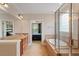 Bathroom with double sinks, soaking tub, and glass enclosed shower at 10012 San Remo Pl, Wake Forest, NC 27587