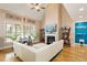 Bright living room features a fireplace, vaulted ceilings, and hardwood floors at 10012 San Remo Pl, Wake Forest, NC 27587