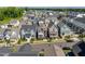 Desirable neighborhood showcasing a variety of new construction homes with beautiful landscaping and sidewalks at 1008 Whistler St, Durham, NC 27713
