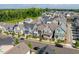 Desirable neighborhood showcasing a variety of new construction homes with beautiful landscaping and sidewalks at 1008 Whistler St, Durham, NC 27713