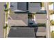 Aerial view of fenced backyard with stone patio, outdoor furniture, and green space, perfect for outdoor living at 1008 Whistler St, Durham, NC 27713