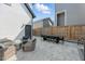 An outdoor living space includes a patio area, ample seating and fenced backyard at 1008 Whistler St, Durham, NC 27713