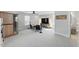 Spacious living room features a sauna, media center, accent chairs, and natural light at 1008 Whistler St, Durham, NC 27713