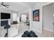 Open-concept living room with modern décor and a view into the dining area and kitchen at 1008 Whistler St, Durham, NC 27713
