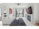 Bright, modern living room with a fireplace, sleek furniture, and a large window for natural light at 1008 Whistler St, Durham, NC 27713