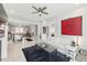 Open floor plan showcases the living room flowing into the kitchen and dining area with hardwood floors at 1008 Whistler St, Durham, NC 27713