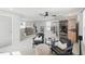 Bright living area features a ceiling fan, accent chairs, sauna and neutral decor at 1008 Whistler St, Durham, NC 27713