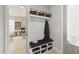 Functional mudroom with built-in bench and storage solutions, perfect for organizing essentials at 1008 Whistler St, Durham, NC 27713