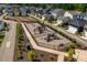 Neighborhood playground with various play structures, seating, and landscaping, perfect for Gathering recreation and enjoyment at 1008 Whistler St, Durham, NC 27713