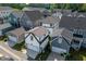 View of modern homes with attached garages and well-maintained landscaping in a Gathering-friendly neighborhood at 1008 Whistler St, Durham, NC 27713