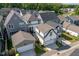 View of modern homes with attached garages and well-maintained landscaping in a Gathering-friendly neighborhood at 1008 Whistler St, Durham, NC 27713